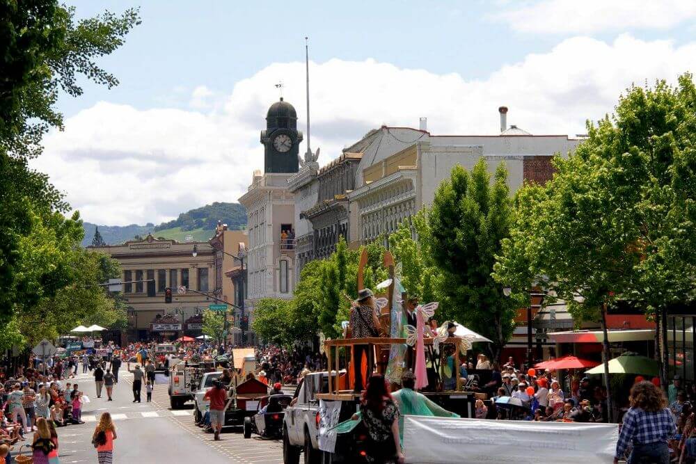Parade in historic town with clock tower