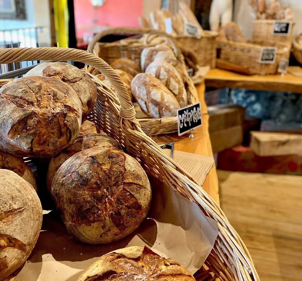 Bread in baskets on table for sale