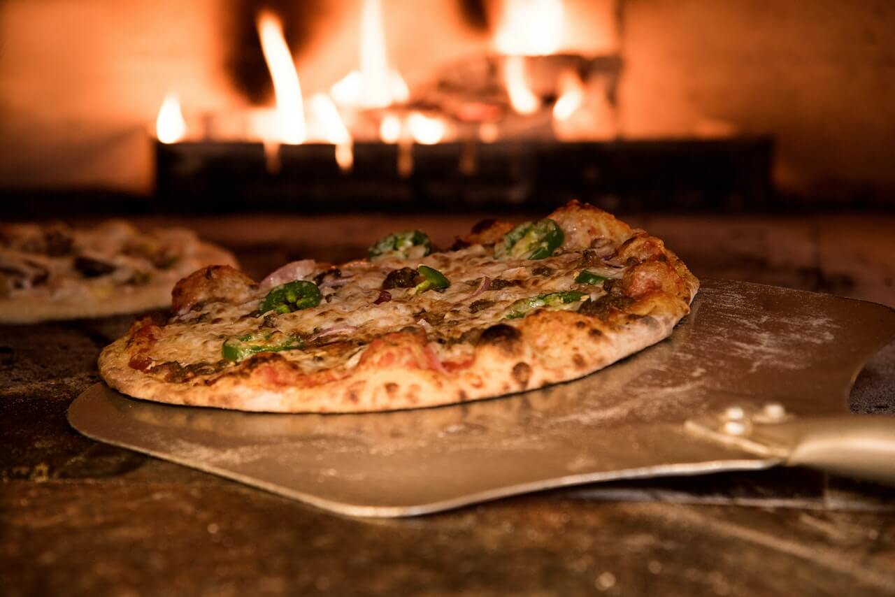 Best pizza parlors in petaluma 3 Pizza on peel in wood-fired oven