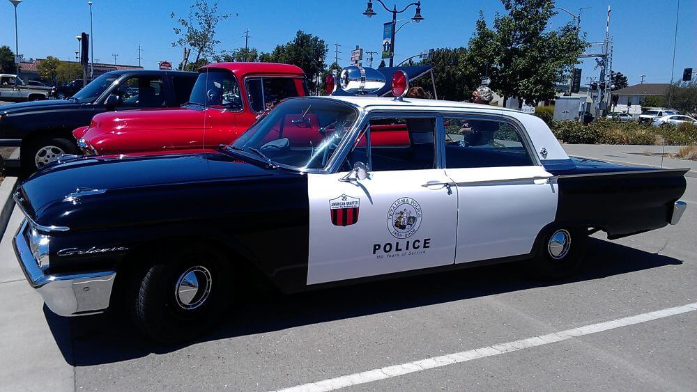 Vintage police cruiser at car show
