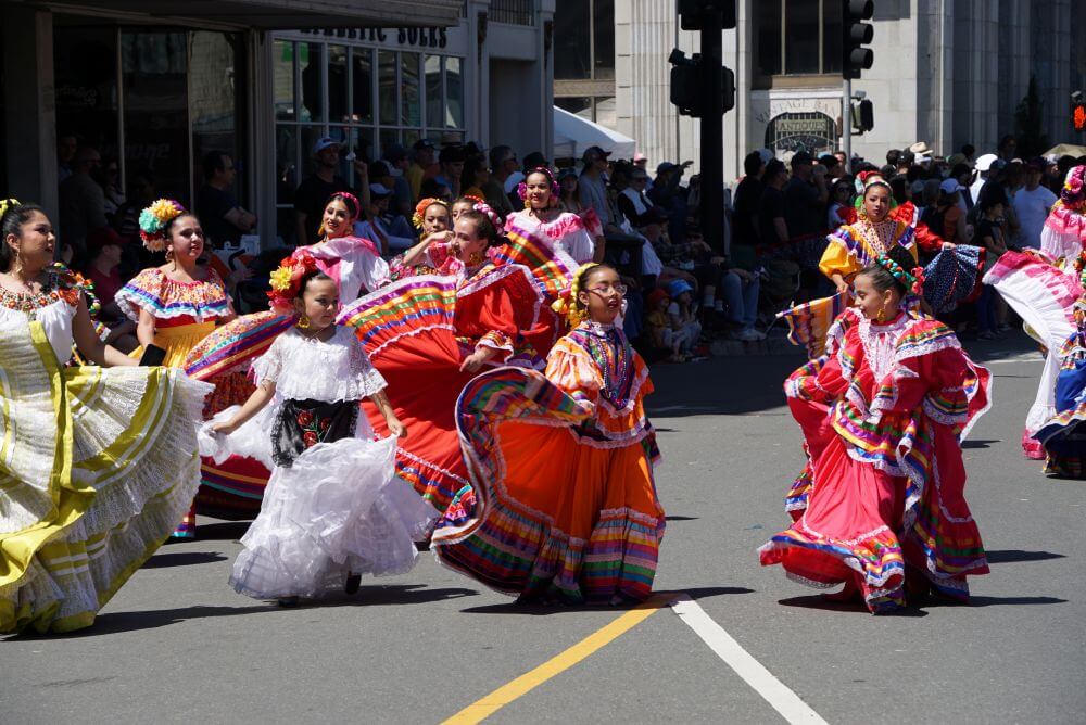 Folklorico dancers in costume in parade