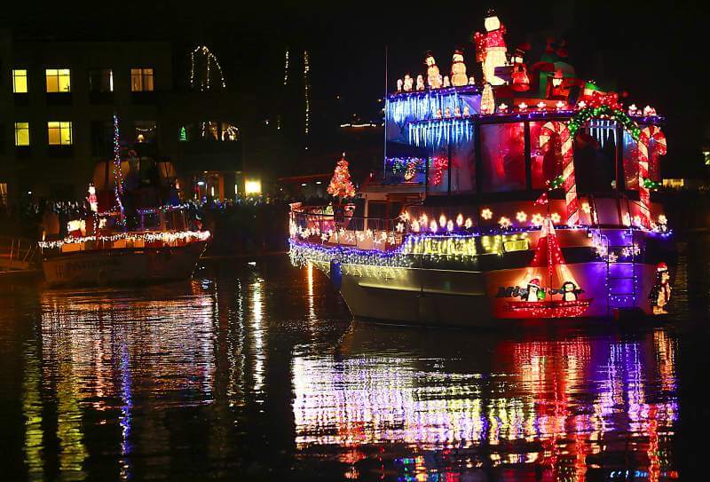 Decorated boats in lighted boat parade