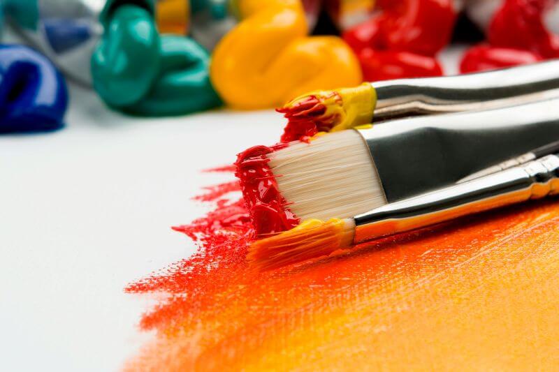 Paintbrushes with vibrant paint colors