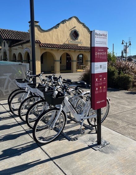 Travel smart to petaluma 4 Bikeshare station with parked bicycles