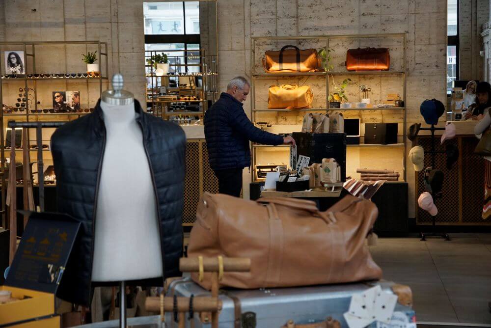Man shopping in stylish boutique