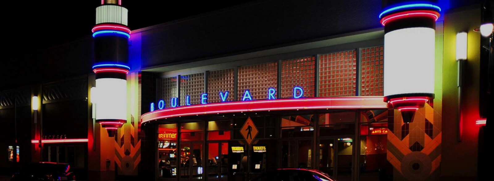 Movie theater facade with "Boulevard" in blue list letters.