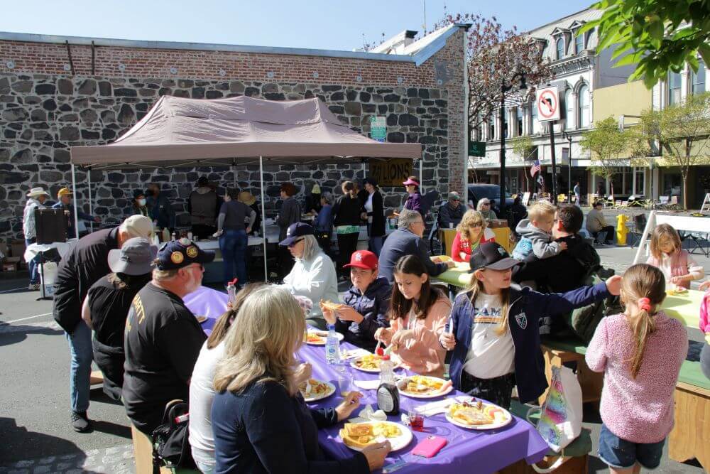 Diners of all ages at a pancake breakfast