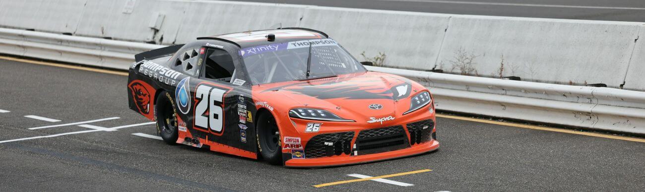 Orange race car on track