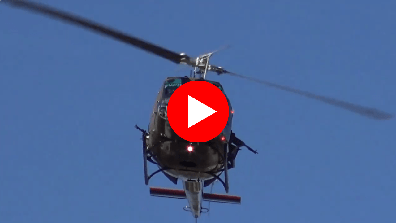 Petaluma veterans day parade & flyover 8 Helicopter flying with red button over photo