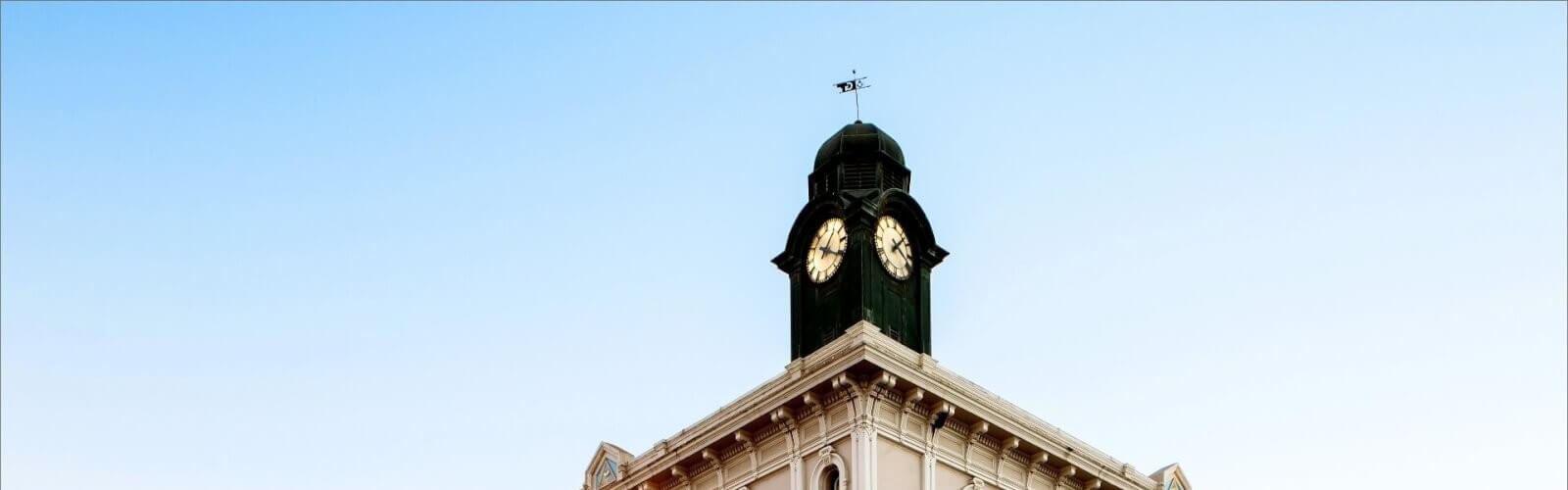 Historical attractions 1 Top of historic building with clocktower.