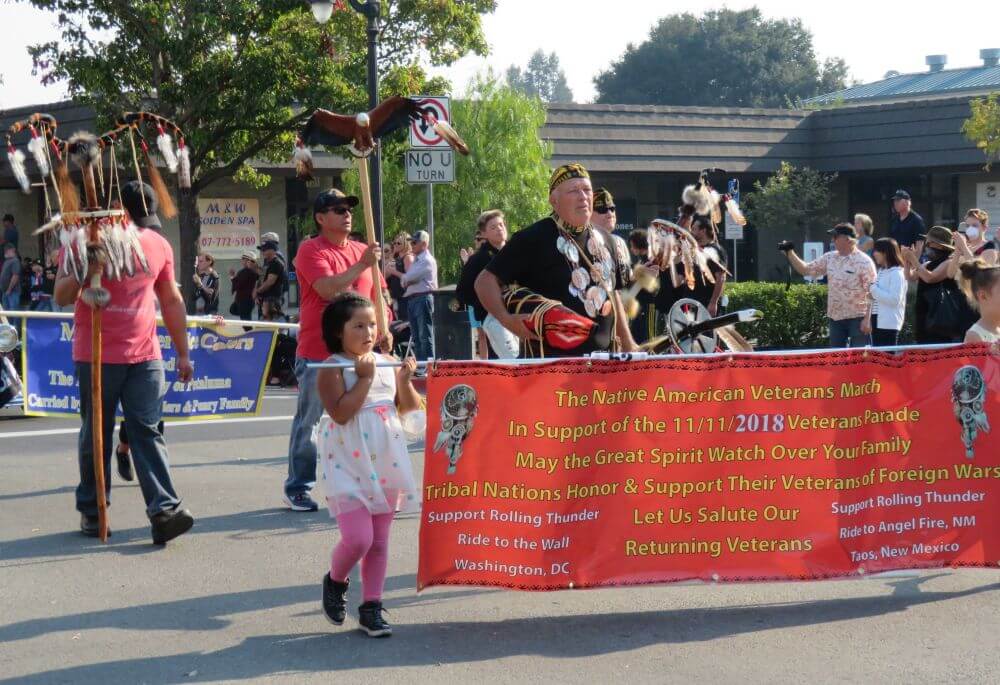 Petaluma veterans day parade & flyover 5 Marchers with native american vets banner