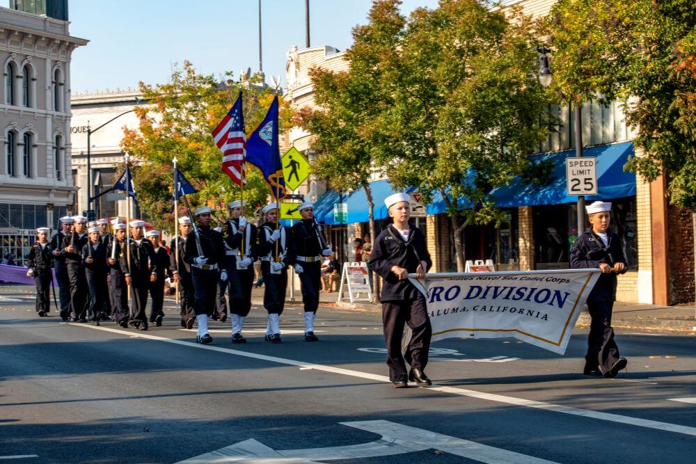 Petaluma veterans day parade & flyover 3 Naval seal cadets marching in parade