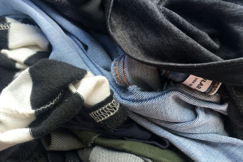 A pile of assorted clothing items.